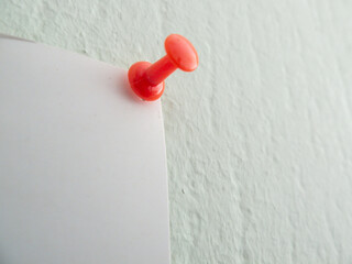 sticker pinned to the red button