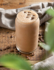 Coffee Smoothie on a rustic table. Healthy drink.