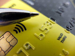 credit card and fountain pen close-ups