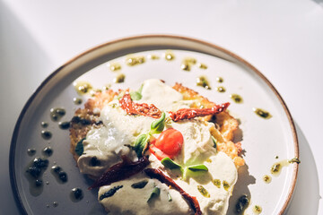 Close-up of vegetable dishes, dietary. Potato pancakes with white garlic sauce. Healthy breakfast in the restaurant. There is a place to copy. High quality photo