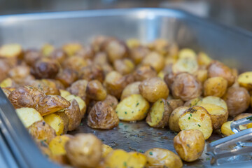 Grilled potatoes prepared on a snack tray.