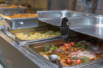 Banquet table at the celebration. Prepared food on the tables.