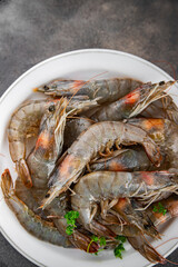 shrimp raw seafood prawns natural food fresh appetizer meal food snack on the table copy space food background rustic keto or paleo diet Pescetarian