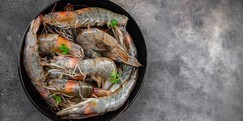 shrimp raw seafood prawns natural food fresh appetizer meal food snack on the table copy space food background rustic keto or paleo diet Pescetarian
