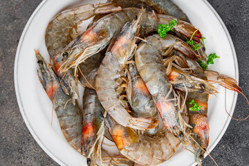 shrimp raw seafood prawns natural food fresh appetizer meal food snack on the table copy space food background rustic keto or paleo diet Pescetarian