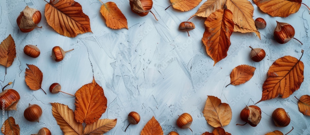 Aufkleber Autumn background with full-frame flat lay featuring chestnut leaves creating a beautiful display with copy space image.