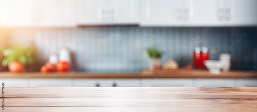 Poster Blurry kitchen room serves as background with table top and copy space image.