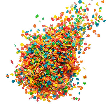 Exploding fruity pebbles cereal, individual separated and pieces floating in Isolated on Transparent background.