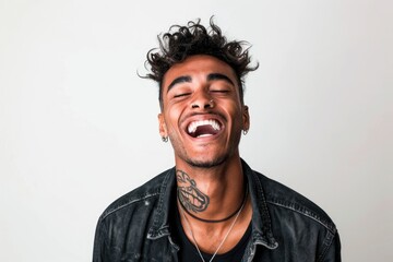Fototapeta premium Young Brazilian man isolated on white background laughing