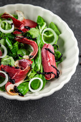 salad duck breast meat magret fresh meal food snack on the table copy space food background rustic top view