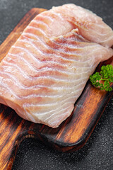 raw fish fillet seafood ready to cook natural fresh appetizer meal food snack on the table copy...