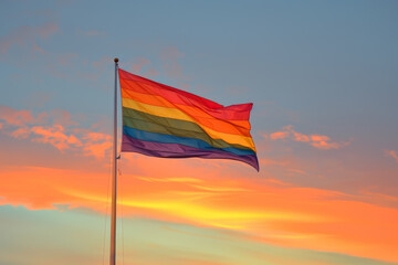 Pride Flag Waving at Sunset