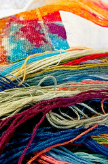 background from multi-colored threads, embroidery floss