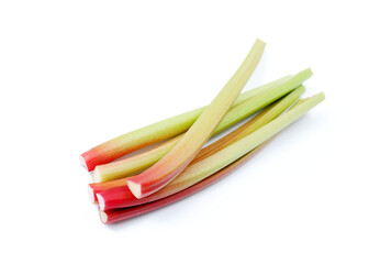 Red and green rhubarb stalks on a white background.