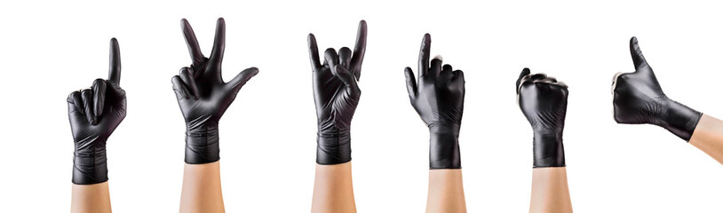 Hands in black gloves showing different gestures, pointing and showing signs
