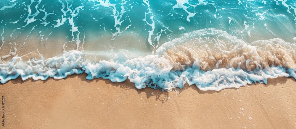 Poster a tranquil ocean wave on a sandy shore, perfect for a summer holiday backdrop with ample copy space 