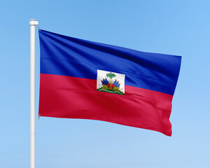 Naklejka premium Haiti flag on stick on sky background. Realistic flag illustration