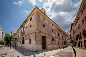 Perspective photo of the Colegio de los Huerfanos building between Santa Teresa and San Nicolas streets in Murcia, Spain