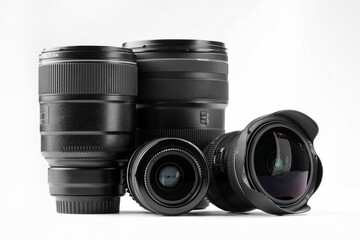 Camera lens on white background. Photographer's equipment