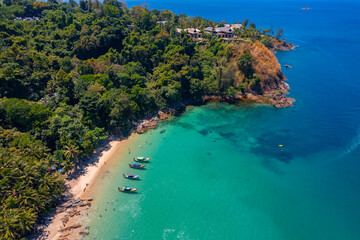 Aerial top view Phuket, Thai boats and turquoise sea, sand beach Banana, travel photo Thailand