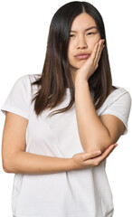 Fototapeta premium Young Chinese woman who is bored, fatigued and need a relax day.