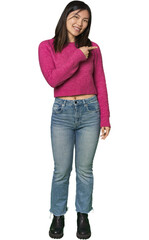 Full-body young Chinese woman smiling and pointing aside, showing something at blank space.