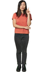 Full-body young Chinese woman having some great idea, concept of creativity.