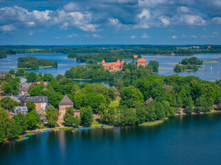 Aerial view of Trakai town and its surroundings, located on Galve lake, Lithuania. Beautiful view from drone in summer
