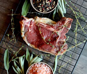 prepared t bone meat on the grill 