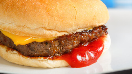 Detail view of a juicy and delicious cheeseburger