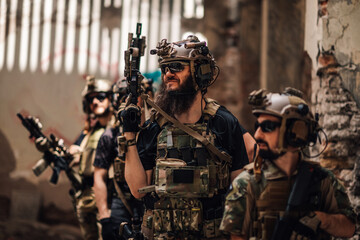 Group of brave soldiers with rifles and weapon ready for action.