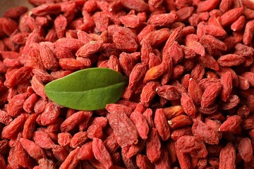 Dried goji berries as background, closeup view