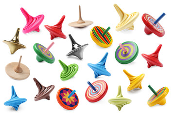 Many different spinning tops isolated on white, set
