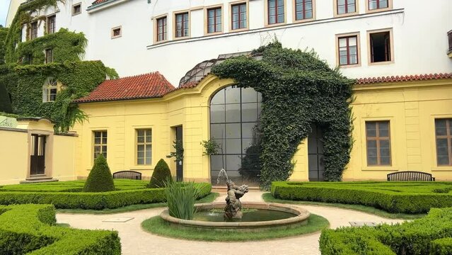 Entrance to Vrtbovska Park in Prague, sculptures and baroque architecture