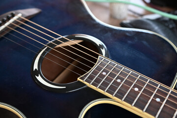 Obraz premium Acoustic Guitar, A standard guitar with steel or nylon strings that produces sound without electronic amplification.