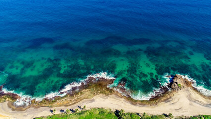 Birdseye aerial view of the Northern Puerto Rico coastline, taken in Arecibo, PR. 