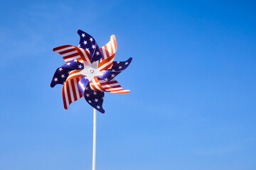 American Pinwheel in Blue Sky. American independence day