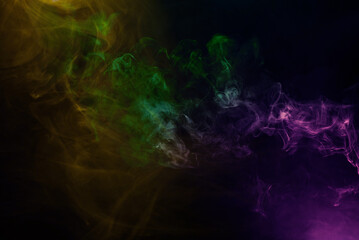 Yellow and pink steam on a black background.