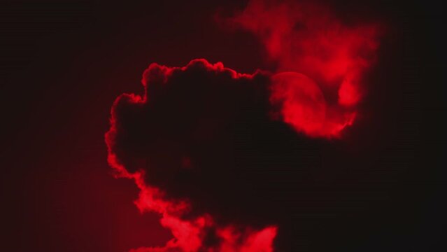 Red Moon Revealed As Clouds Move At Night
