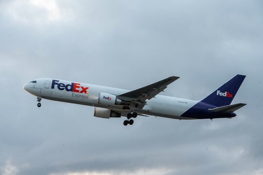 Los Angeles, California, United States, December 09, 2023 - FedEx Boeing 767 taking off on a cloudy day from Los Angeles International Airport.
