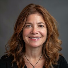 Fototapeta premium Professional Portrait of Smiling Mature Woman with Brown Hair