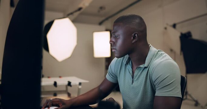 Photography, man and editing on computer in studio with production process, image retouch and catalog inspection. Photographer, african person or typing on pc backstage for creative photoshoot review