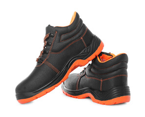 Pair of comfortable working boots isolated on white