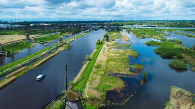 Aerial View of Windmills on Water Canal in Village Kinderdijk, The Netherlands