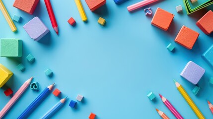 Mathematical Learning with Colorful Cubes and School Supplies on Light Blue Background: Top View with Copy Space