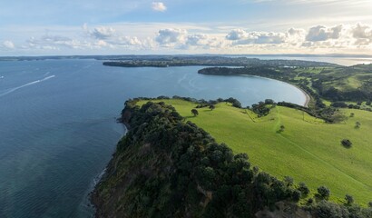 Headland and farmland in Shakespeare Regional Park. Army Bay, Whangaparāoa, Auckland, New Zealand.