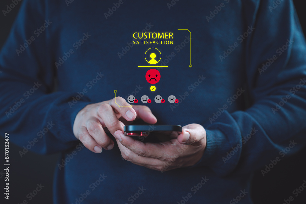 Fototapete man use a mobile phone give angry emotion face on virtual screen for feedback review satisfaction se