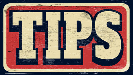 Aged and worn tips sign on wood