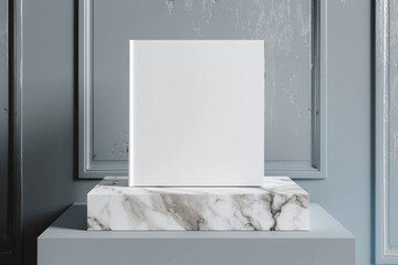 Blank white book cover mockup on marble pedestal, minimalist empty book template