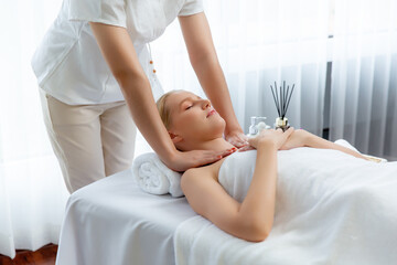 Caucasian woman customer enjoying relaxing anti-stress spa massage and pampering with beauty skin...